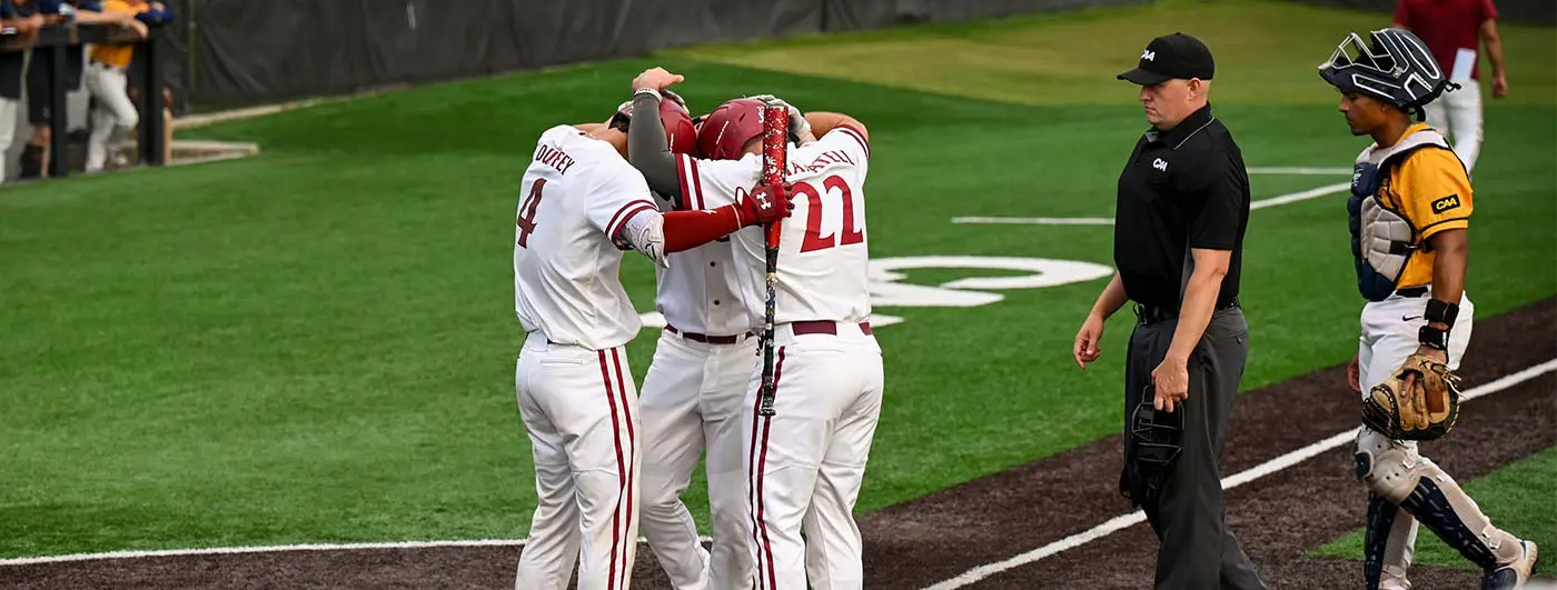 Baseball players hugging