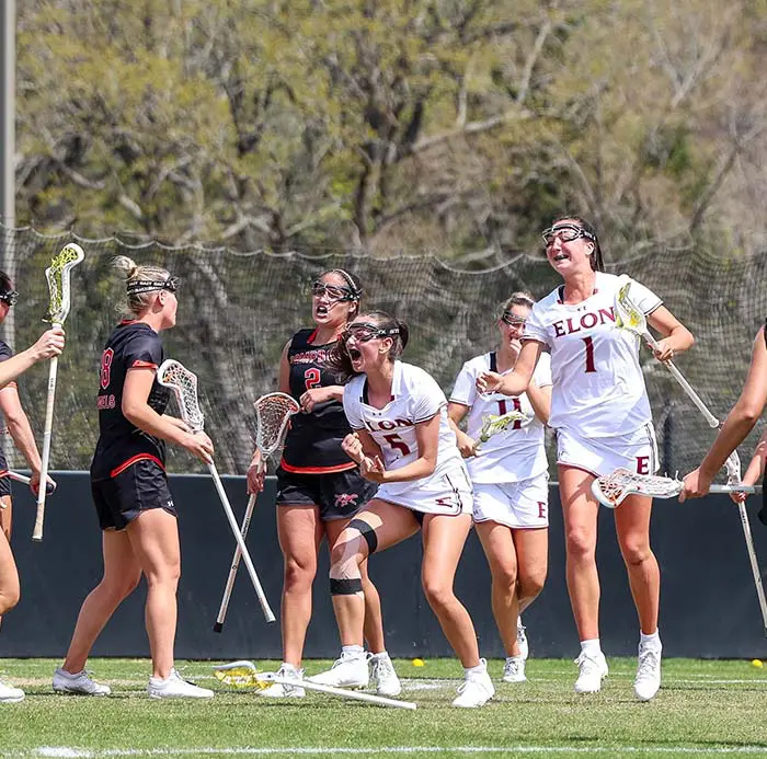 Phoenix statue in front of building on campus